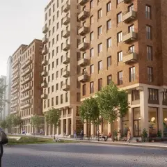 En livlig gata i Sverige med moderna bostadshus i träfasad, gröna träd och människor som njuter av en solig dag. En känsla av ceder sverige.